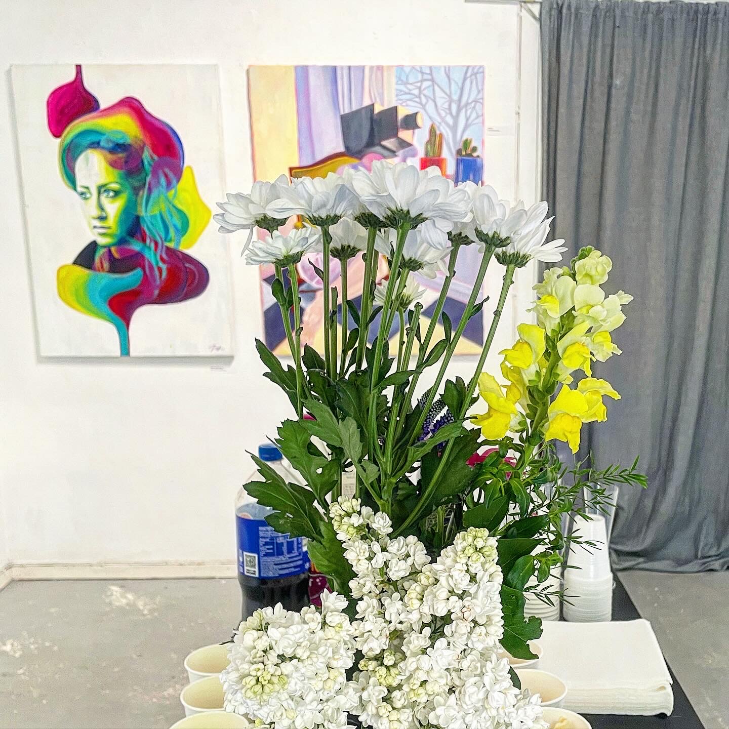 flowers on table on exhibition art paintings